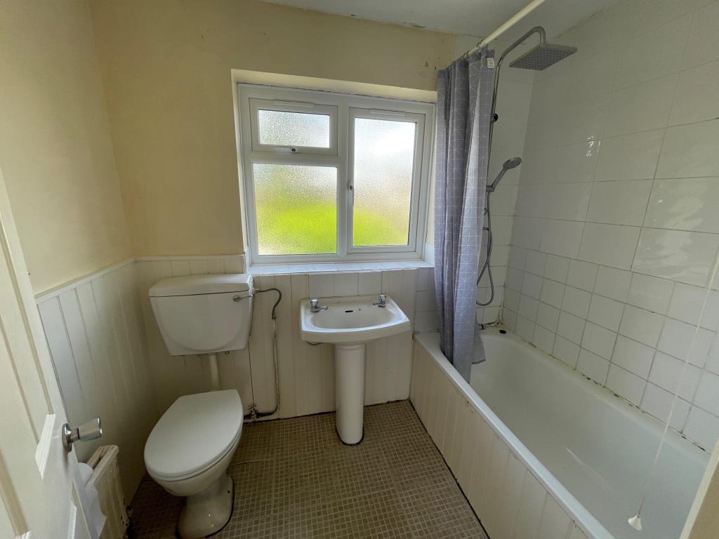 Lot: 178 - SEMI-DETACHED HOUSE FOR IMPROVEMENT - A w.c. pedestal wash basin and bath with shower over
